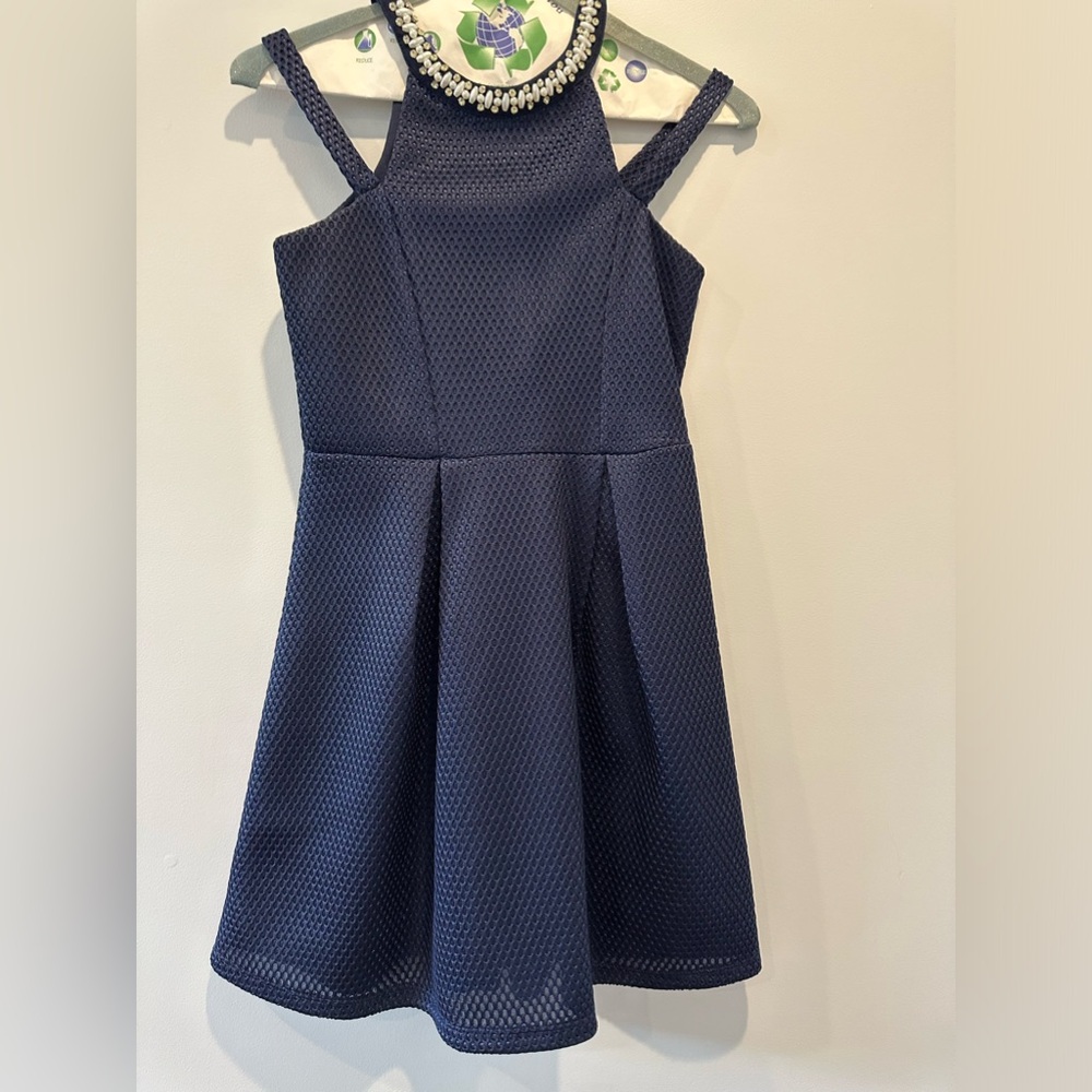 Dress worn, Dry cleaned.